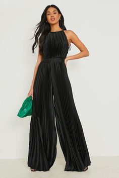 Womens Pleated High Neck Wide Leg Jumpsuit - Black - 10 - Sitting pretty at the top of our wishlist this season is this wide leg jumpsuit from our latest collection. Naturally working to balance out your silhouette by creating the illusion of an hourglass figure, this one-piece garment elongates the legs and slims the waistline...winner. Make a statement in a wide leg denim jumpsuit paired with western boots and soft waved hair, or choose a classic black wide leg jumpsuit and prepare to turn hea Outfits For Thanksgiving, Jumpsuit Prom, Black Jumpsuit Outfit, Jump Suits, Dance All Night, Draping Fabric, Rompers Womens Jumpsuit, Satin Jumpsuit, Suits Design