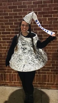 a girl in a tinfoil dress and hat