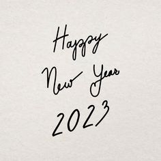 happy new year 2012 written in black ink on a white paper with the words'happy new year 2012 '