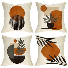 four pillows with abstract designs on them, one is orange and the other is black