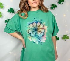 Cute St Patricks Four Leaf Clover Shirt,Watercolor St Patrick Tshirt, St Patricks Day,Shamrock Sweatshirt,Gift For St Patricks [Please note: Due to variations in monitor displays, actual colors may slightly differ from images.] The Comfort Colors 1717 tee is made with medium fabric (6.1 oz/yd² (206.8 g/m consisting of high quality, 100% ring-spun US cotton for long-lasting comfort. The relaxed fit keeps the wearer comfy in both casual and semi-formal settings while the crew neckline delivers tha Green Crew Neck Tops For St. Patrick's Day, St. Patrick's Day Graphic Tee With Print, Cheap St. Patrick's Day Graphic Tee, St. Patrick's Day Cotton Crew Neck Tops, Green Short Sleeve T-shirt For St. Patrick's Day, Fun Sweatshirts, Four Leaf Clover, Clover Leaf, Semi Formal