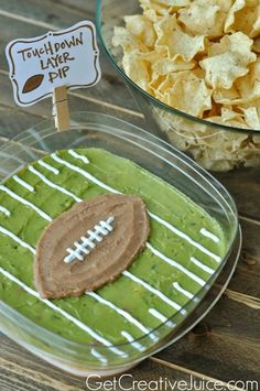 a bowl of chips and a plate with a football on it