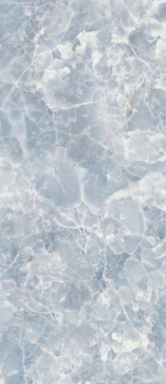 an abstract marble background with light blue hues