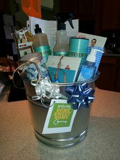 a silver bucket filled with personal care items