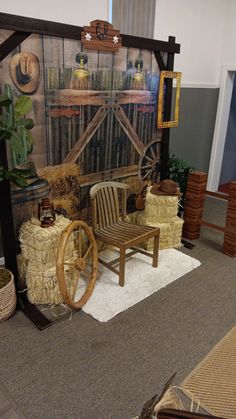 a room filled with furniture and decor on display in front of a wooden wall mural