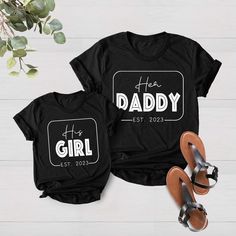 Daddy and Me Shirt, Father Daughter Matching Shirt, Family Matching Outfits, Fathers Day Gift, Fathers Day Shirt, Gifts for Dad 🎀Welcome to the DerikoClothing! 👕🎁 BLACK TEXT is used for Yellow, Heather Peach, White, Athletic Heather, Mint, Pink, Baby Blue Shirts. Other colored shirts have white text. F I T ∙ & ∙ S I Z I N G : ✨Women's sizes are narrower than the waist. ✨Sleeves are rolled up in some product pictures. They do not come rolled up on delivery. T I M E ∙ T O ∙ D E L I V E R Y : ✨Processing and production time is 1-2 business days. I M P O R T A N T ∙ P L E A S E ∙ R E A D ∙ F U L L Y : ✨ Order cancellations are accepted for 2 hours after purchase. ✨For any questions, please contact me directly. It's my pleasure to assist you. Orders placed till 12 noon are shipped the next b Black Tops With Letter Print For Family Matching, Black Slogan Top For Father's Day, Dad Daughter Matching Outfits, Black Tops With Letter Print For Mother's Day, Father's Day Matching Family Shirts, Father Daughter Matching Shirts, Dad Daughters Shirt, Father And Daughter Tshirt Ideas, Black T-shirt With Lettering For Father's Day