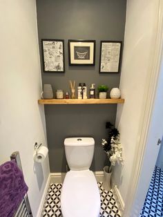 Dark grey feature wall, rustic shelf with black and white wall art and flooring. Small Toilet Paint Ideas, Small Toilet Colour Ideas, Grey Small Toilet Ideas, Small Grey Toilet Ideas, Small Downstairs Toilet And Utility, Wc Ideas Downstairs Loo, Tiny Shower Room, Small Toilet Decor, Small Half Bathroom