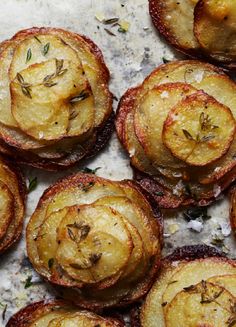 baked potatoes with herbs and salt on top