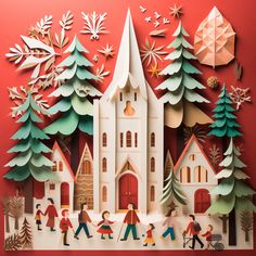 paper cut christmas scene with people walking in front of a church and snow covered trees