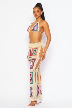 The Mali Crochet Pants Set is perfect for summer. It is crafted from high quality materials and features bright vibrant multi color crochet detailing. Perfect for vacations and summer concerts. 100% Acrylic Multicolor Beach Pants For Beach Season, Multicolor Pants For Beach And Spring Season, Multicolor Beach Pants For Spring, Multicolor Spring Beach Pants, Spring Multicolor Beach Pants, Bohemian Multicolor Bottoms For Beach Party, Multicolor Bohemian Bottoms For Beach Party, Multicolor Pants For Beach Vacation, Multicolor Pants For Vacation And Beach Season