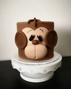 a cake with a monkey face on top of it