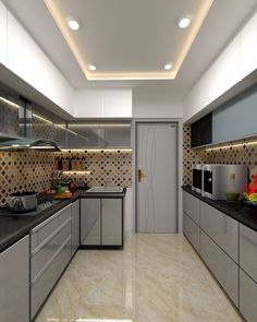 a modern kitchen with stainless steel cabinets and counter tops is shown in this rendering image