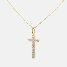 Add a touch of sparkle to your style with our Dazzling Diamond Cross Pendant Necklace. This cute necklace features a delicate chain and a shimmering diamond-studded cross. Perfect for any occasion, it’s a timeless accessory that shines with every move. Treat yourself or gift it to someone special—this necklace is both a fashion statement and a symbol of faith. * Product color and quality as seen on a monitor may vary slightly compared to actual items due to photography lighting conditions and individual screen color calibration. Please contact us for questions regarding additional item details. Diamond Accented Crucifix Necklace For Gift, Crucifix Necklace With Diamond Accents Gift, Crucifix Necklace With Diamond Accents, Dainty Cross Jewelry In Cubic Zirconia, Dainty Cross Necklace In Cubic Zirconia, Dainty Cross-shaped Cubic Zirconia Jewelry, Dainty Cubic Zirconia Cross Jewelry, Dainty Cubic Zirconia Cross Necklace, Dainty Cross Necklace