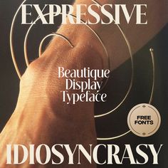 a magazine cover with an image of a person's hand holding a spiral design