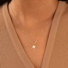 Discover the delicate allure of our Dainty Clover Necklace--a symbol of luck and charm crafted in your choice of gold filled, sterling silver, or rose gold filled. This exquisite necklace seamlessly combines elegance and whimsy, making it a perfect addition to your everyday wardrobe. 🍀 Symbol of Luck: The dainty clover pendant is a timeless symbol of good fortune. Wearing this necklace not only adds a touch of sophistication to your style but also invites positive energy and luck into your life Jewellery Stack, Shamrock Necklace, Good Luck Clover, Luck Necklace, Initial Disc Necklace, Good Luck Necklace, Clover Jewelry, Engraved Bar Necklace, Clover Pendant