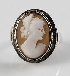 *Size 5 *Gorgeous genuine Carved Shell Cameo set in sterling Silver. *Simple, classic style with lovely fluted shoulders. *All hallmarks have since worn away. *Dates from the 1900s to 1910s. *This ring is in Excellent shape for being over 100 years old! It does show normal signs of wear & a moderate patina for its age. *Elegant Victorian Era piece you will enjoy for generations to come. Own a piece of history today! *You will receive the exact item pictured. *All professional cleaning is left up Simple Classic Style, Topaz Yellow, Sterling Silver Garnet Ring, Sterling Silver Brooch, Carved Shell, Rhodolite Garnet, Natural Jade, Silver Brooch, Professional Cleaning