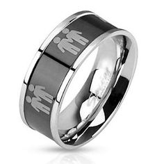 a black and silver ring with the word mr on it