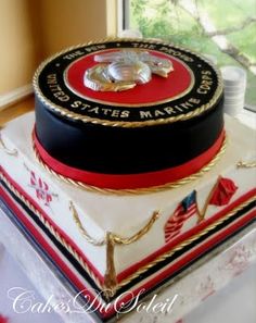 this is a cake made to look like the united states marine seal on top of it