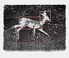 a black and white photo with red lines in the shape of a dog on it's back