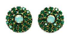 Emerald green rhinestones form a wreath around the turquoise centerpiece in these dazzling green rhinestone earrings. These gorgeous rhinestone studs are made of the finest Austrian crystals. Emerald green earrings are always a huge favorite.Earring diameter is 1.25 inches. Green Jeweled Round Earrings, Green Crystal Earrings With Sparkling Stones For Party, Green Crystal Earrings For May Birthstone Party, Wedding Green Crystal Rhinestone Earrings, Green Rhinestone Crystal Earrings For Wedding, Green Crystal Rhinestone Earrings For Wedding, Green Sparkling Stones Earrings For Party, Turquoise Centerpieces, Emerald Green Earrings