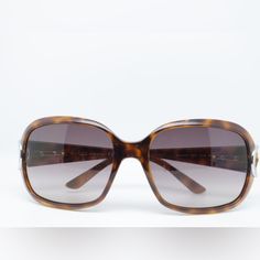 Gucci Brown Havana Gg 3132/S Shell Bamboo Horsebit Rectangular Sunglasses When Aiming For A Sophisticated And Sharp Appearance In Professional And Formal Settings, These Gucci Rectangular Sunglasses Are The Perfect Choice To Leave A Lasting Impact. Crafted From Brown Havana Shell Acetate Frames And Arms, These Sunglasses Stand Out Thanks To The Unique Silver Tone Horsebit Detail On The Temples, Adding A Distinctive Touch To Your Look. In Fair Condition With Signs Of Wear. Scratches And Marks On Lenses/Frame But Nothing That Affects Aesthetic Or Vision. Elegant Gucci Sunglasses For Formal Occasions, Formal Gucci Sunglasses, Gucci Formal Sunglasses With Uv Protection, Formal Gucci Sunglasses With Glass Lenses, Elegant Silver Sunglasses For Beach, Formal Brown Sunglasses, Gucci Rectangular Sunglasses, Sunglasses Stand, Rectangular Sunglasses