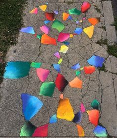 the sidewalk is painted with colorful colors