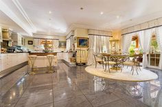 the large kitchen is clean and ready to be used for dining room or family room