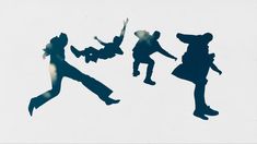 the silhouettes of three people jumping in the air with their arms up and legs spread out