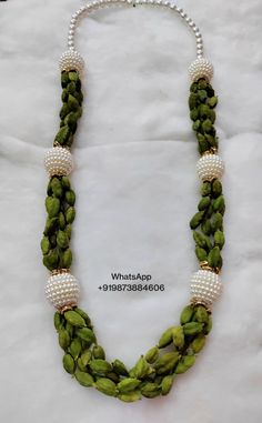 Traditional Handmade Mala As Gift, Bohemian Handmade Mala For Diwali, Handmade Bohemian Mala For Diwali, Traditional Handmade Mala For Puja, Traditional Handmade Mala For Diwali, Traditional Green Mala As Gift, Traditional Handmade Green Mala, Handmade Green Traditional Mala, Traditional Green Mala As A Gift