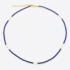 This stunning Necklace showcases the beauty of faceted Lapis Lazuli beads combined with delicate freshwater rice pearls, resulting in a truly unique and captivating design. The deep blue hue of the Lapis Lazuli beads exudes an air of timeless elegance and sophistication, perfectly complemented by the subtle charm of the freshwater rice pearls. MATERIALS: Metal: Gold Plated Brass Pearls: Natural Freshwater Pearls Stone: lapis lazuli DIMENSIONS Necklace Length: 17 inches(~43cm) + 2.5 inches extension PROCESSING & SHIPPING All of my pieces are shipped from the US, and I currently ship to customers in the US and Canada. I offer free shipping on all orders within the US. Shipping times will vary depending on your location, but I do my best to ensure that your order is shipped out as quickly as Pearl Necklace With Lapis Lazuli Gemstone Beads, Lapis Lazuli Gemstone Beads Pearl Necklace, Blue Lapis Lazuli Pearl Necklace Gift, Blue Pearl Necklace With Faceted Beads, Elegant Blue Beaded Necklace With Pearl Drop, Blue Pearl Necklaces With Gemstone Beads, Blue Pearl Necklace With Natural Stones, Adjustable Blue Pearl Necklace With Gemstone Beads, Adjustable Blue Pearl Necklace