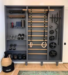 a gray cabinet filled with lots of gym equipment