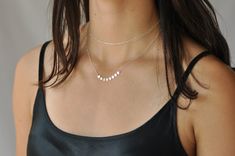 "Our chain choker is so versatile and looks stunning alone or layered with your favorites. Just the right amount of sparkle to get noticed!! Our gift to you 10% off your first purchase. Details here - http://eepurl.com/dpVPBz DETAILS 14 k gold fill or sterling silver Our model is wearing this necklace at approximately 16\" and 17\" but it looks gorgeous at shorter lengths too!! This listing is for one necklace only. See picture 1 for the style of necklace you will receive A 2\" extender chain al Chic Silver Layered Necklace For Gift, Dainty Silver Layered Necklace For Party, Delicate Silver Layered Choker Necklace, Delicate Silver Choker Layered Necklace, Silver Layered Necklace With Delicate Chain For Weddings, Silver Delicate Chain Layered Necklace For Wedding, Minimalist Layered Choker Necklace, Wedding Silver Layered Necklace With Delicate Chain, Wedding Silver Delicate Chain Layered Necklace