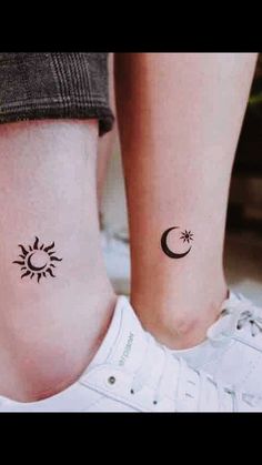 two small tattoos on the legs of people with sun and moon tattoo designs on them