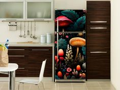 a kitchen with a refrigerator covered in colorful artwork