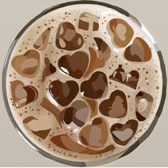 a cup of coffee with lots of hearts on it