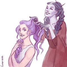 two women with purple hair and one is combing the other's long hair