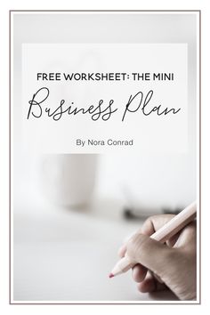 a hand holding a pencil with the words free worksheet the mini business plan