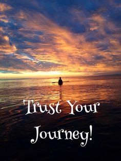 a person in the water with a sunset behind them and text that reads trust your journey