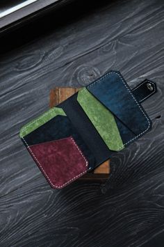 Multicolor minimalist leather wallet, bright bifold for man, comfortable spacious cardholder, pocket wallet  PRODUCT FEATURES  Stylish compact wallet with wide functionality. The accessory does not take up much space and fits in your pocket. The model is suitable for both men, women and children. The product is made of Italian buttero leather from the Walpier factory. It is one of the oldest tanneries in Italy, producing quality vegetable tanned leather. The factory is located in the historic ar Multicolor Bifold Card Holder, Wallet Inspiration, Crochet Giraffe Pattern, Leather Wallet Design, Leather Wallet Pattern, Minimalist Leather Wallet, Men Wallet, Compact Wallet, Handmade Leather Wallet