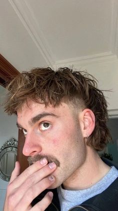 The Best 25 Modern Mullet Haircuts for Men (Detailed Gallery) | 25 Trendy Modern Mullet Haircuts for Men: The Ultimate Guide To New Mullet Hairstyles Frosted Tips Mullet, Men’s Short Fade Mullet, Muller Hairstyle Men, Dyed Mullet Men, Mullet Hairstyle Mens Short, Aussie Mullet, Mullet Moustache, Australian Mullet, Mullet And Mustache