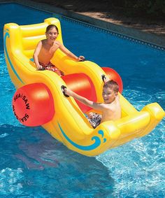 two people riding on an inflatable boat