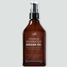 LADOR Premium Morocco Argan Oil 100ml ▶ Brand : LADOR ▶ Country of origin : Republic of Korea ▶ Target Area : Hair ▶ Skin Type : All Hair Types ▶ Condition : 100% Brand-new ▶ Capacity : 100ml / 3.38 fl. oz ▶ Product description  Nutrients to dry and rough hair. A nourishing hair shampoo that helps manage healthy hair by supplying moisture and nutrients to dry and rough hair. Hair shampoo for dry and rough hair Hair moisture and nutrition ▶ How to use After towel dry, spread it on the wet hair al Argan Hair Oil, Argan Oil Hair, Oil Treatments, Moisturize Hair, Nourishing Hair, Hair Serum, Hair Care Routine, All Hair Types, Natural Essential Oils