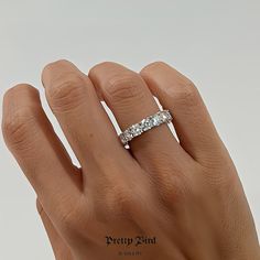 Product Details + Care - Triple Platinum Plating Over 925 Sterling Silver - 8 Carat Total Genuine Moissanite - Wipe Clean Certificate Of Authenticity Included. Photos Pretty Bird Usa Llc 2023 Ig @Prettybird_usa Www.Prettybirdjewelry.Com Vvs Clarity Moissanite Eternity Band, Luxury Gia Certified Round Eternity Band, Lab Grown Diamond Eternity Band For Promise, Round Lab Grown Diamond Eternity Band Promise Ring, Luxury Half Eternity Moissanite Band, Luxury Moissanite Half Eternity Band, White Diamond Cut Round Eternity Band, Lab Grown Diamond Eternity Band With Diamond Cut, White Gold Moissanite Eternity Band