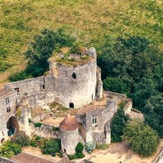 an aerial view of a castle in the countryside