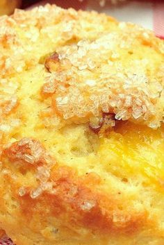 a close up of a pastry on a plate with other pastries in the background