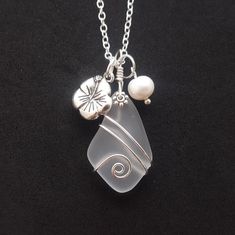 "Aloha! These design shows my love for this beautiful island of Hawaii. This item will be made to order and shipped directly from Hawaii. This is a sea glass pendant with a tarnish resistance silver plated chain necklace.The chain is a 20 inches long (can be customized from 30 inch down to any length if you leave me a note with the order for the preferred length) with a lobster claw catch. This handmade in Hawaii jewelry gift is from cultured sea glass that are specially formed into its shape fo Wire Crystal Necklace, Wire Crystal, Beach Glass Necklace, Hawaii Jewelry, Sea Glass Bracelet, Hawaiian Jewelry, Sea Glass Earrings, Sea Glass Pendant, Wire Wrapping Crystals