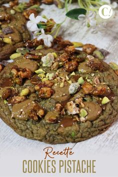 a cookie with nuts and other toppings on it