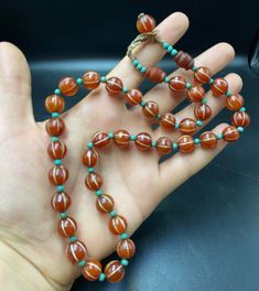 Beautiful antique Buddhist agate bead necklace with small turquoise from Tibet Antique Amber Jewelry With Polished Beads, Vintage Turquoise Gemstone Beads Jewelry, Traditional Beaded Jade Jewelry, Spiritual Turquoise Necklace With Polished Round Beads, Spiritual Turquoise Necklace With Polished Beads, Traditional Hand-strung Jade Beaded Necklace, Spiritual Round Turquoise Necklace With Polished Beads, Traditional Jade Necklace With Gemstone Beads, Traditional Jade Beaded Jewelry