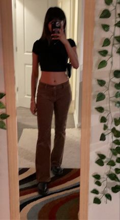 Brown Low Waisted Jeans Outfit, Low Rise Brown Jeans Outfit, Low Rise Brown Corduroy Pants Outfit, Low Rise Brown Pants Outfit, Brown Low Rise Jeans Outfit, Low Rise Corduroy Pants Outfit, Brown Coudroy Pants Outfit, Black Top Brown Pants, Brown Flare Jeans Outfit