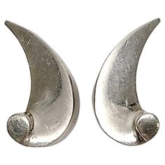 Taxco, Mexico 970 silver Wave Design screwback earrings by Antonio Pineda. These screwback earrings feature renowned master silversmith Antonio Pineda's iconic wave design. Measures approx 1 1/8" high, 1/2" wide at widest point. Weighs 16g, 10.3dwt. Marked Eagle 17 970 Pineda Crown Very nice vintage condition with minor surface scratching and mild tarnish. Item will be packaged securely and shipped with insurance. Earrings For Sale, Wave Design, Screw Back Earrings, Vintage Bracelets, Ruby Lane, Anton, Ring Holder, Gold And Silver, Ruby